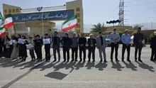 زنجیره انسانی دور نیروگاه‌ها کازرون کشیده می‌شود