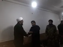 دیدار حجت الاسلام پولادی مسئول دفتر نمایندگی ولی فقیه درسپاه حضرت ولیعصر (عج) خوزستان با خانواده شهید حسن خدادادی کریموند در مسجدسلیمان